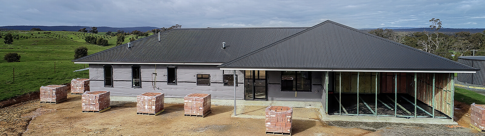 Residential home on property during construction