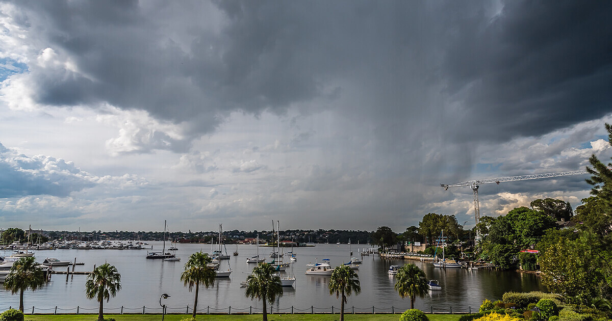 Rain falling over bay in Australia